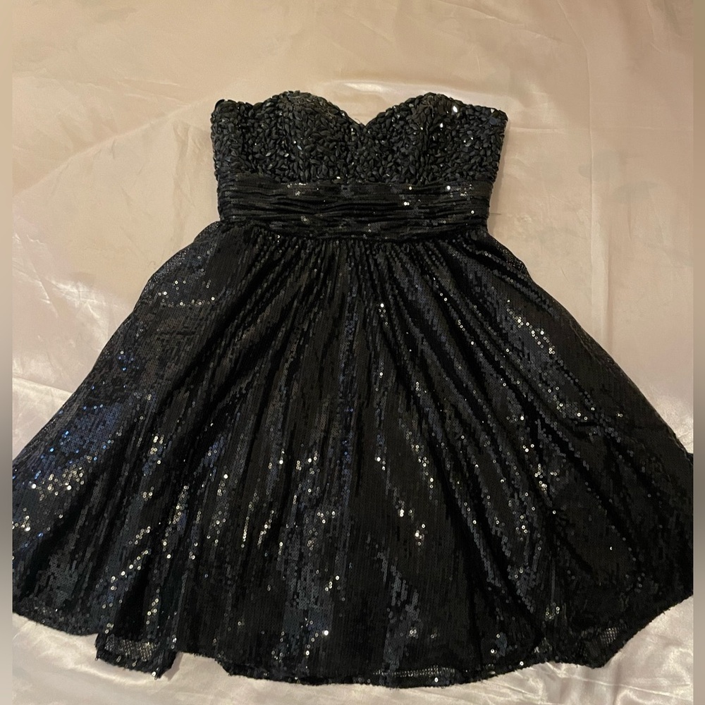Very cute black strap less sparkly dress